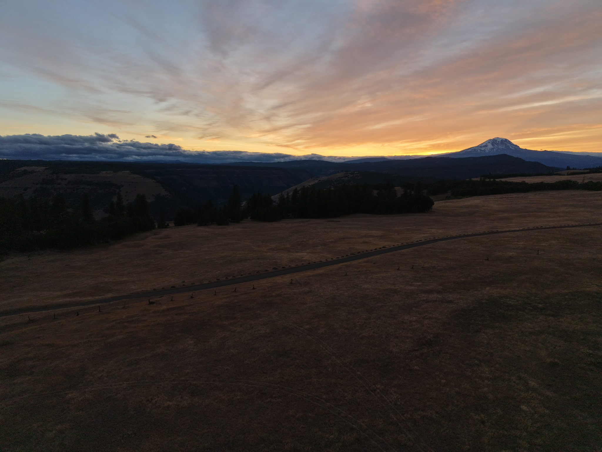 Aerial landscape at sunset with Mount Adams in the distance